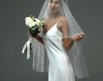 Wedding veil with pencil edges, hip-length, two-tier veil with secured edge