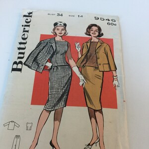 May include: Vintage sewing pattern for a dress and jacket. The pattern is from Butterick and is number 9546. The pattern is for a size 14 bust 34. The pattern is for a dress and jacket. The dress is a black and white checkered pattern. The jacket is a solid brown color. The pattern is on a white background with red and white text.