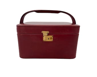 Czerwona skórzana kosmetyczka w stylu vintage z uchwytem blokującym w kolorze złotym i beżowym wnętrzem