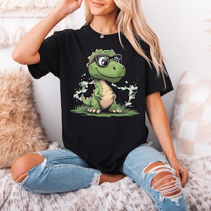 Entzückendes Cartoon-Dinosaurier-T-Shirt für Kinder & Dino-Liebhaber, Verspieltes und schrulliges Mode-Shirt, süßes grünes Dino-Brillenoberteil, lustiges T-Shirt für Kinder