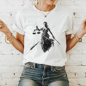 Lady Justice Symbolic Unisex Tee, Legal Advocate Shirt, Balance of Power Law T-shirt, Scales Sword Fairness Tee, Bold Statement Fashion,
