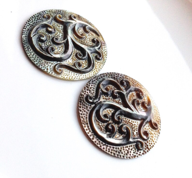 Ornate South Sea Carved Shell Briolette Pair