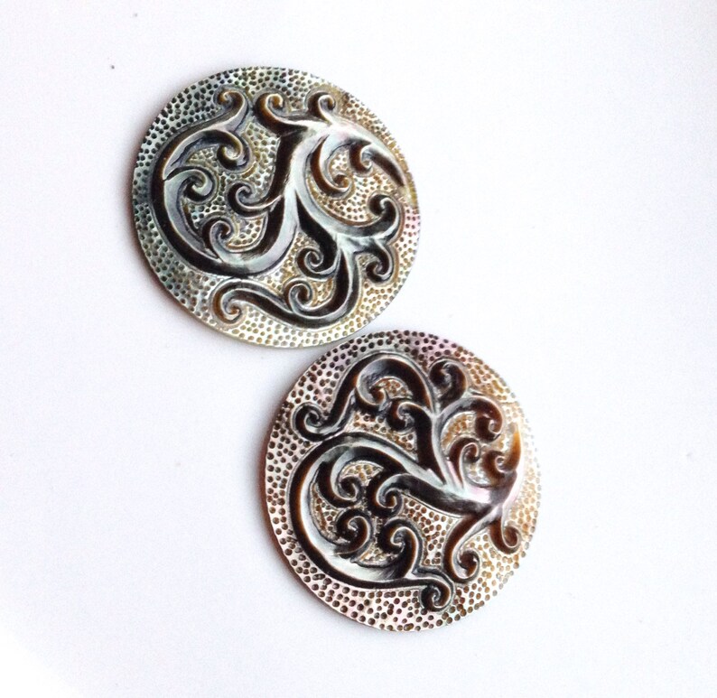 Ornate South Sea Carved Shell Briolette Pair