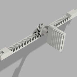 May include: White plastic cable tie with a locking mechanism. The tie has a serrated edge and a lever to tighten the tie.