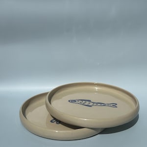 Plate with fish motif