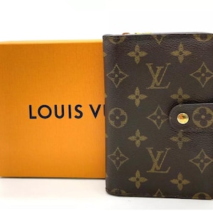 Lujosa cartera con cremallera y monograma de Louis Vuitton: en perfecto estado y como nueva
