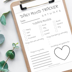 May include: A printable daily mood tracker with a checklist of emotions, a section for things that went well and things that didn't go well, a space to write things on your mind, and a heart shape for something you are grateful for.