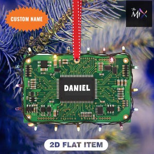 May include: A green circuit board Christmas ornament with the name "DANIEL" in white. The ornament is decorated with small lights and a red ribbon for hanging. Text on the ornament reads "CUSTOM NAME" and "2D FLAT ITEM".