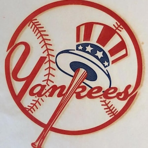 May include: A red, white, and blue baseball logo with a baseball bat and the word "Yankees" in a red script font.