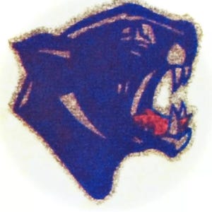 May include: A blue and red cartoon panther with an open mouth, facing right. The panther is a mascot for a school or team.