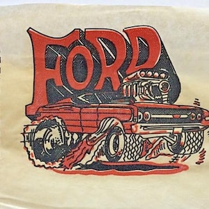 May include: A red and black illustration of a Ford car with the word "FORD" in large red letters above it. The car is driving through a red and orange flame-like design.