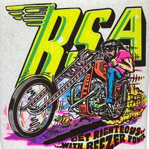 May include: A colorful graphic featuring a motorcycle with a rider. The word "RSA" is in large, neon green letters with a wing design. The phrase "GET RIGHTEOUS...WITH BEEZER POWER" is at the bottom. The motorcycle is orange and blue.