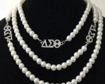 Dreieck-Sigma-Theta-Kunstperlen-handgemachte seitliche Halskette