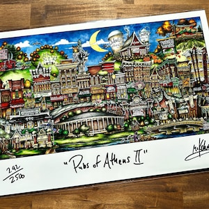 May include: A colorful illustration of a city scene with buildings, trees, and a river. The title "Pubs of Athens II" is written in black ink at the bottom of the image. The image is numbered 292/250.