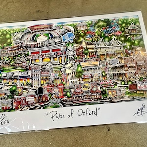 May include: A colorful illustration of a map of Oxford, England, featuring pubs and landmarks. The image is titled "Pubs of Oxford" and is numbered 237/250.