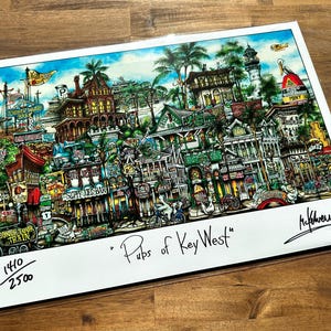 May include: A colorful illustration of a street scene in Key West, Florida. The image is titled "Pubs of Key West" and is signed by the artist. The image is numbered 140/250.