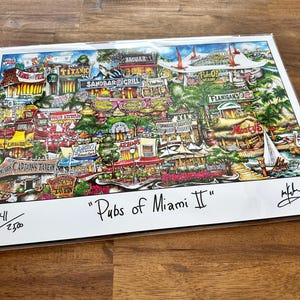 May include: A colorful print titled "Pubs of Miami II" featuring a detailed illustration of various bars and restaurants. The artwork includes the text "Titanic," "Sandbar Grill," and "Flanigans." The print is numbered 41/2500 and signed.