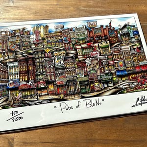 May include: A colorful illustration of a city street scene with multiple buildings, each with a unique storefront and signage. The illustration is titled "Pubs of BloNo" and is numbered 450/2500.