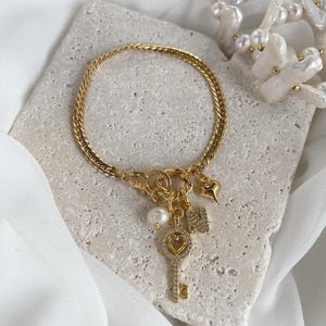 Gold Plated Zircon Key Charm Bracelet – Herringbone Chain, Zircon Letter, Special Design, Eye-Catching Jewelry