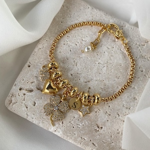 Pulsera bañada en oro con dijes de trébol, corazón, elefante, estrella y letra con circonitas de la suerte, regalo elegante para cualquier ocasión