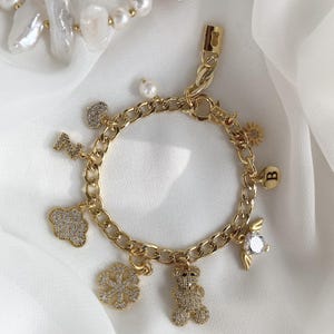 Gold-Plated Panda-Themed Charm Bracelet – Zircon Accents, 10 Charms, Striking and Stylish Design