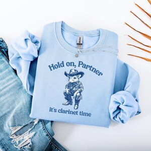 Hold On Partner its Clarinet Time Funny Opossum Cowboy Unisex Sweatshirt, Clarinet Lover Gift, Clarinetist Crewneck, Retro Animal Print