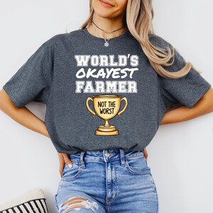 Worlds Okayest Farmer, Funny Trophy Unisex T-Shirt, Not the Worst Farmer Tee, Softstyle Coworker Gag Gift Shirt, Relatable Graphic Tee