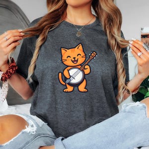 Banjo Cat Cartoon Animal Print Graphic Tee Funny Unisex Musician Shirt, Cat Playing Banjo, Banjo Player Gift, Bluegrass Shirt, Cat Lover
