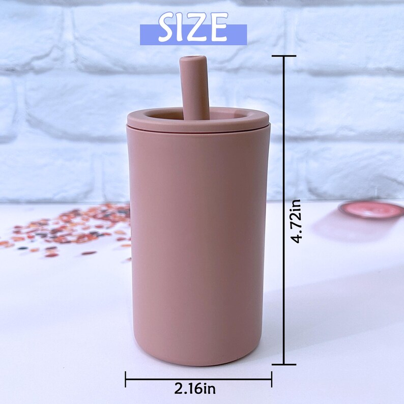 May include: A light brown silicone tumbler with a lid and a straw. The tumbler is 4.72 inches tall and 2.16 inches wide. SIZE is written in blue letters above the tumbler.