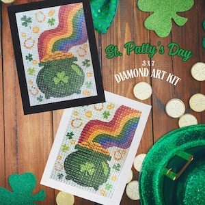 May include: A 5x7 inch diamond art kit featuring a pot of gold at the end of a rainbow. The kit is titled "St. Patty's Day Diamond Art Kit".