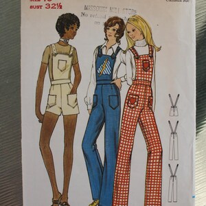 May include: Vintage Butterick sewing pattern 6155 featuring illustrations of three figures in overalls. The overalls are in white, blue, and red plaid. The pattern includes size 10 and bust 32 1/2 inches. The pattern is from Missouri Mill Store.