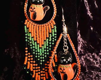 Oorringen met franje kat op pompoen.