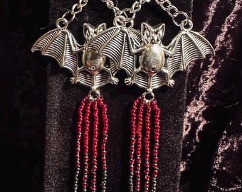 Bat with fringes and spike - red/ gray