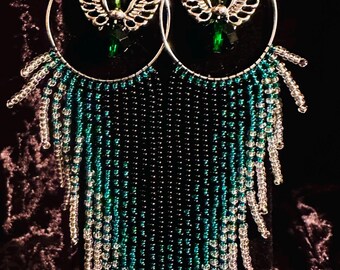 Gevleugelde ringoorbellen met een engelgroen