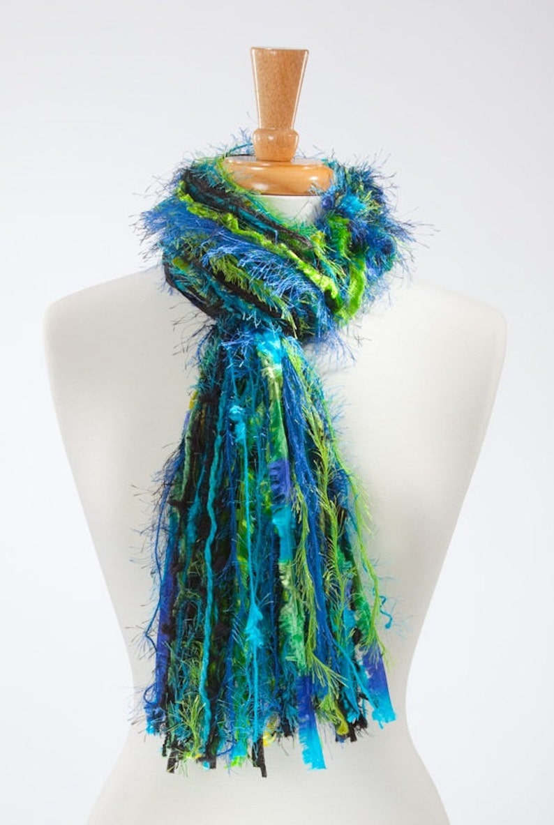 All fringe knotted scarf in shades of black, turquoise and lime green