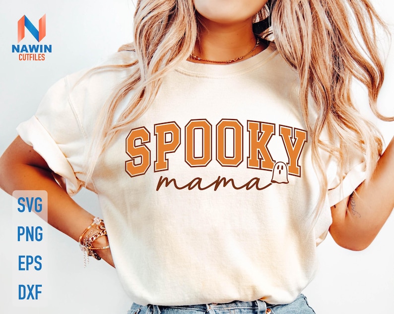 May include: Cream-colored t-shirt with the words "SPOOKY mama" in orange and brown lettering, featuring a ghost graphic. The shirt is part of a Halloween-themed design, with SVG, PNG, EPS, and DXF file options.