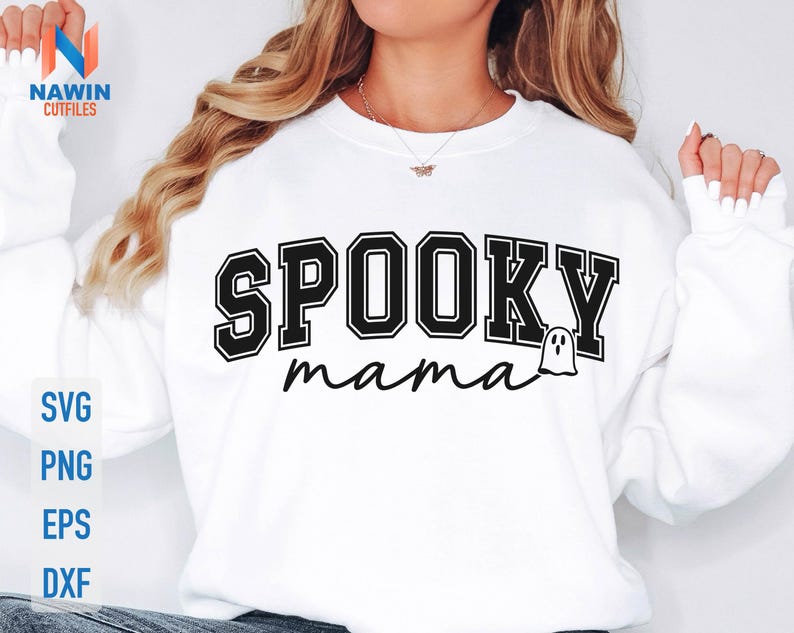 May include: White sweatshirt with the words "SPOOKY mama" in black block letters and a ghost graphic. The sweatshirt also has the words "SVG, PNG, EPS, DXF" in blue letters.