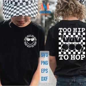 May include: Black t-shirt with a white graphic of a smiley face wearing sunglasses and the text "Too Hip To Hop" in a circle. The back of the shirt has a white graphic of three bunny rabbits wearing sunglasses with the text "Too Hip To Hop" in a checkered pattern.