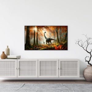 May include: A framed print of a dinosaur walking through a misty forest with a warm, orange glow. The dinosaur is black and the forest is a mix of brown, orange, and green.