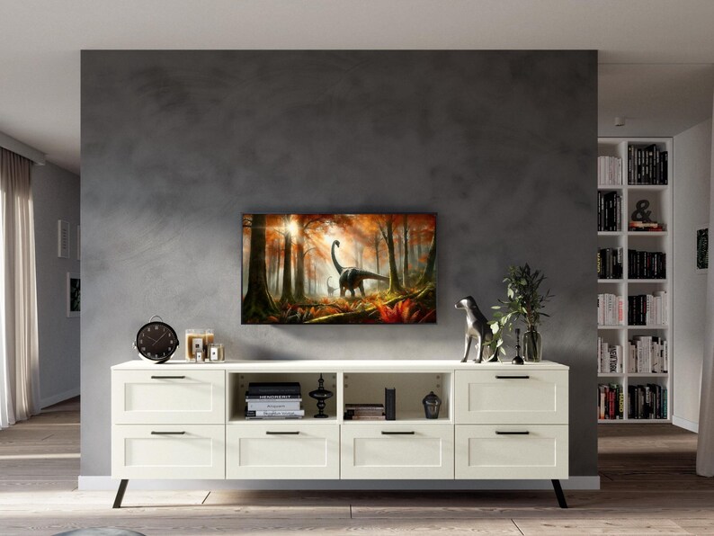 May include: White entertainment center with four drawers and three open shelves. The center has black metal legs and is against a gray wall. A framed print of a dinosaur in a forest is above the entertainment center.
