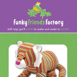 May include: A soft toy tiger named Taylor, with colorful striped fabric in red, orange, green, and yellow. The plush toy is 16.5 inches long and has white accents on the ears and collar. The image includes the text "funky friends factory".
