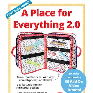 May include: A Place for Everything 2.0 organizer bag, featuring a red and white patterned exterior with black zippers and interior pockets. Includes a detachable strap and handles. The bag is designed for organizing and storing various items.
