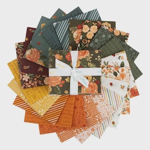 May include: A collection of fabric squares in various patterns and colors, including floral, striped, and solid designs. The fabrics are arranged in a circular pattern, with a central bundle tied with a white ribbon. The color palette includes shades of orange, green, and yellow.