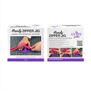 May include: Two boxes of the "Handy Zipper Jig" are displayed. The boxes feature the product name and instructions for use. The product is a purple, hexagonal tool for changing zipper pulls. The text on the box reads "Change Your Zipper Pull With Ease."