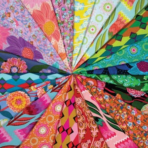 May include: A vibrant display of patterned fabric swatches arranged in a circular fan. The fabrics feature a variety of floral and geometric designs in a spectrum of colors, including pink, orange, blue, and green. The image showcases a diverse collection of textiles.