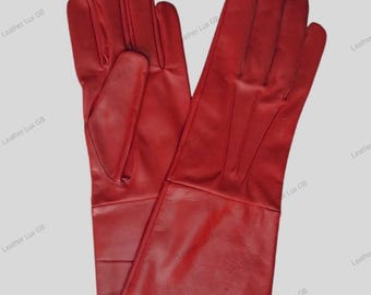 May include: A pair of long red leather gloves. The gloves have a smooth leather finish and are fully lined.