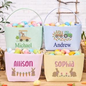May include: Four Easter baskets filled with colorful eggs. Each basket is a different color: green, blue, pink, and yellow. The baskets have handles and are decorated with Easter-themed designs and names: Michael, Andrew, Allison, and Sophia.