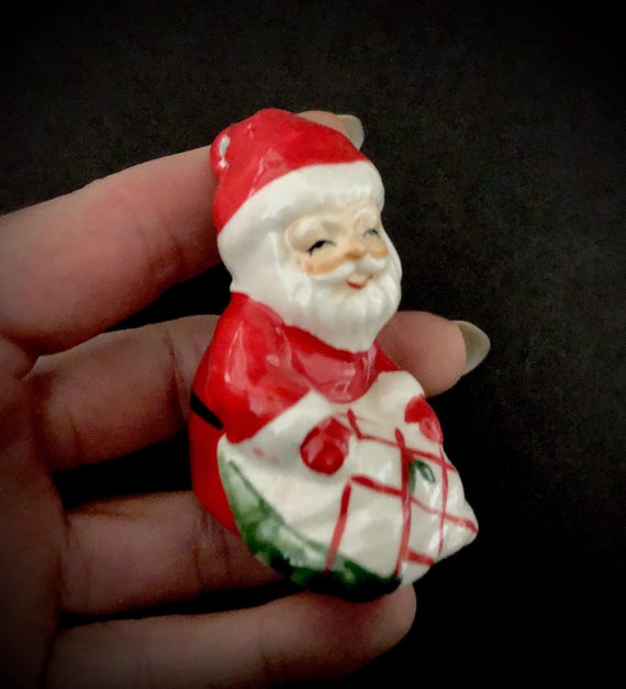 Lefton Santa and Mrs. Claus in Candycane Sleigh Salt Pepper Set