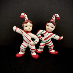 Older Christmas Candycane Kids with candycane shaped arms vintage MCM midcentury candy cane