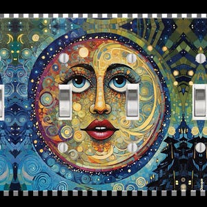 May include: Decorative light switch cover featuring a celestial design. The artwork depicts a smiling moon face with blue eyes and red lips, surrounded by a colorful mosaic of stars and swirling patterns. The cover has three light switches and a black and white striped border.